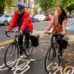 Two people cycling