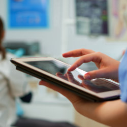 person using ipad