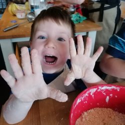 Excited child holding up outstre