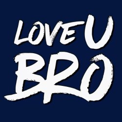 man with tattoos using a pen to write I love you on another mans forehead