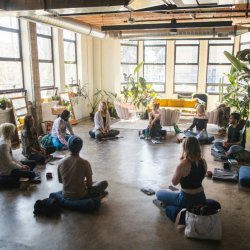 https://unsplash.com/photos/a-group-of-people-sitting-in-a-circle-in-a-room-ciqbTWuGgBI