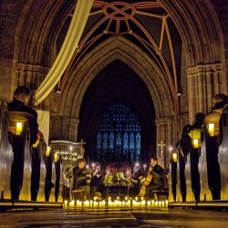 Egerton Strings string quartet performing in the beautiful candlelit St Mary's Church