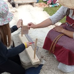 heddle weaving with a viking lady