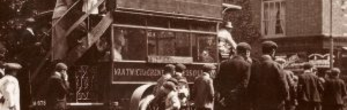 black and white photograph of old fashioned bus