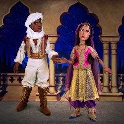 Marionettes dressed up in Arabian garb.