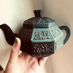 a black teapot gift box