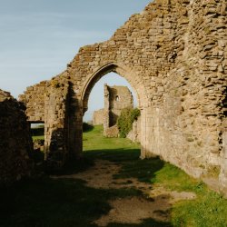 View through the arches of the ruins of Hastings Caste