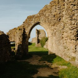 View through the arches of the ruins of Hastings Caste