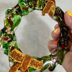Green glass disc garland with gold ribbon