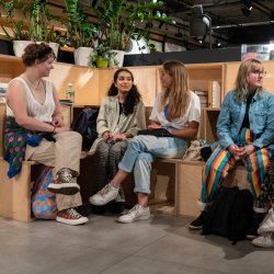 A picture of people mingling at a New Blood Portfolio event