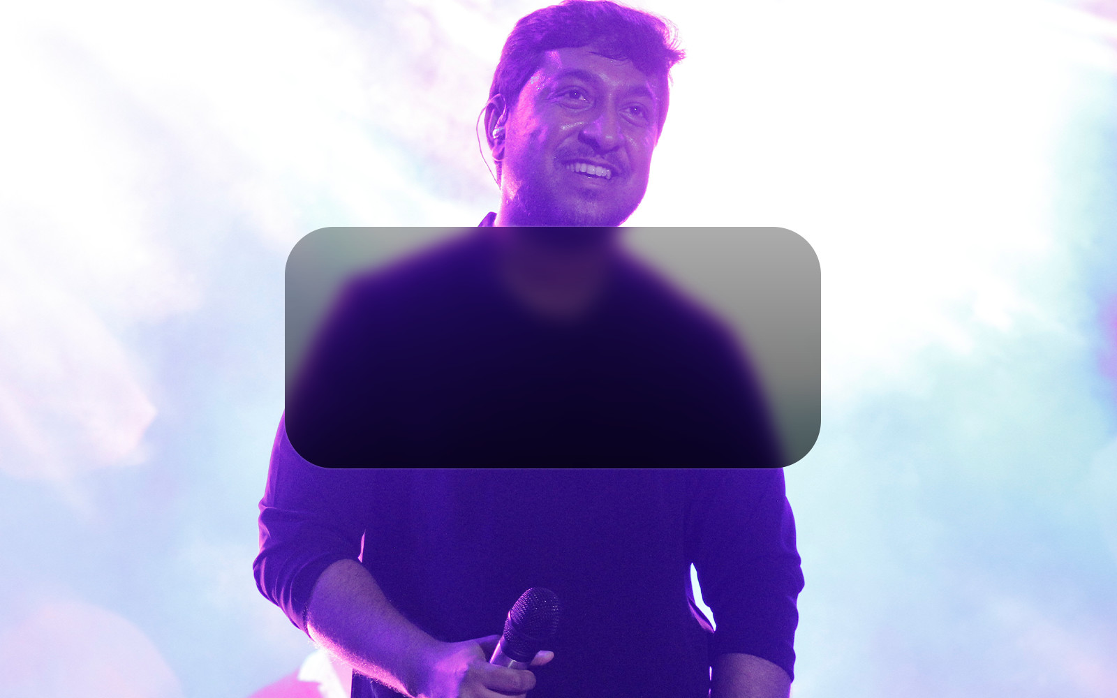 Image contains Actor/Musician Vineeth Sreenivasan in the poster in singing position with a microphone, with details of the venues in the UK