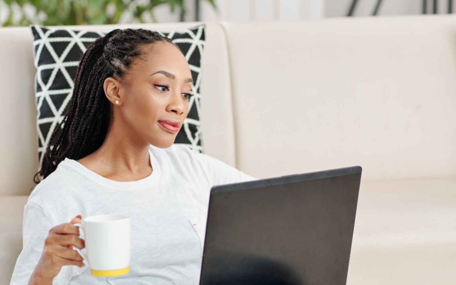 woman viewing her laptop