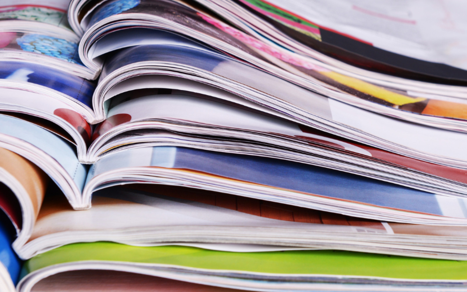 This is an image of a pile of magazines