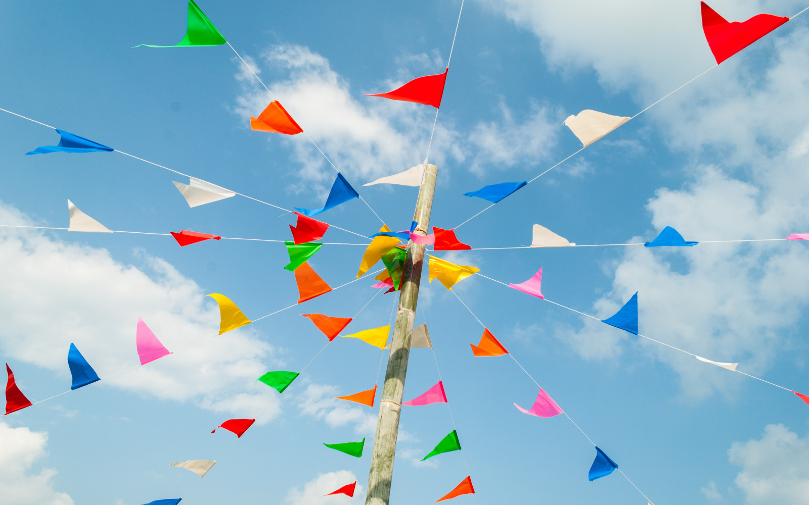 Totem pole with multi-coloured bunting