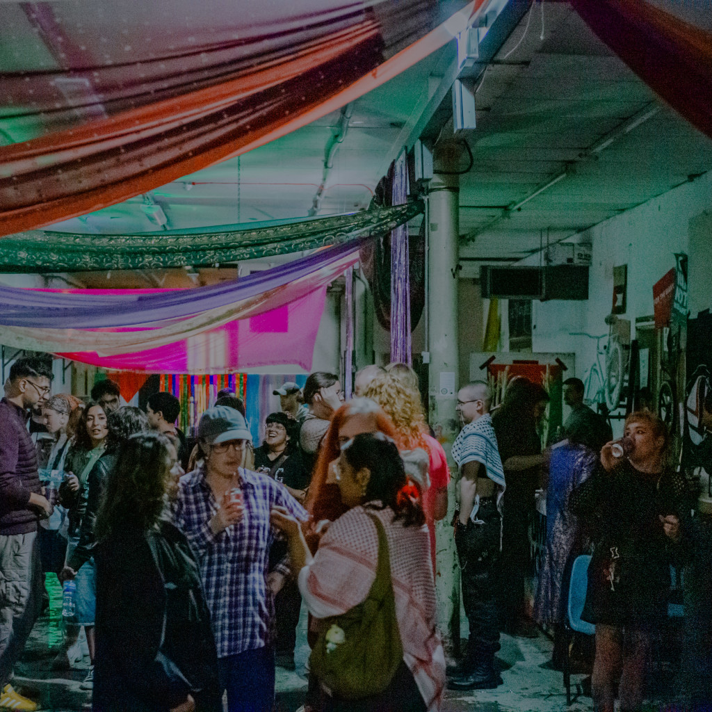 a blur of people in colourful, clashing clothes.