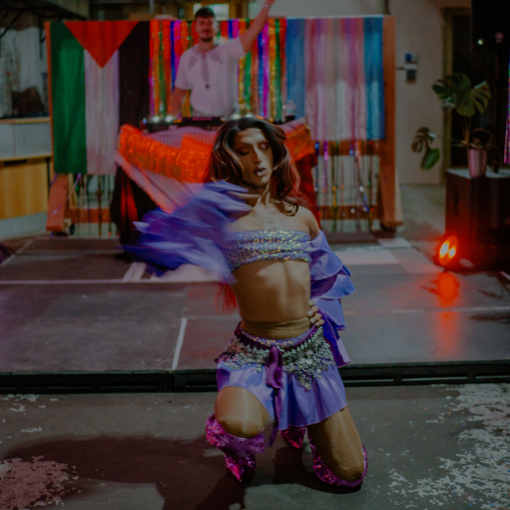 a blur of people in colourful, clashing clothes.