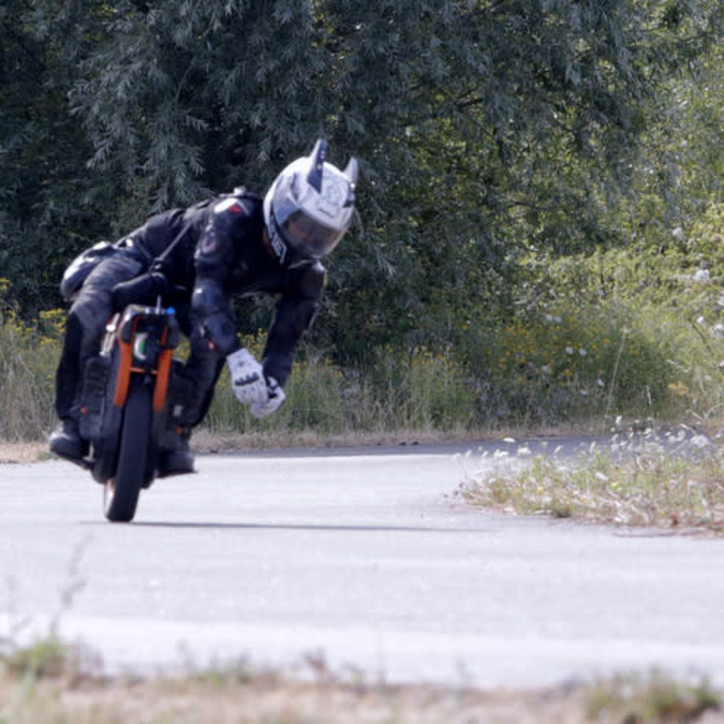 Group of Personal Electric Vehicle Riders Ride Out Ebike Esk8
