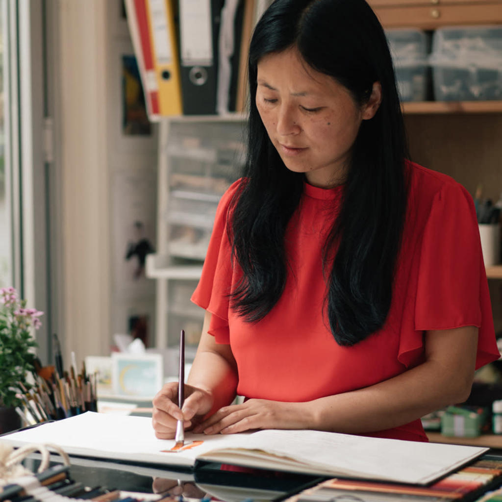 Our artist Ping He explaining her color choices