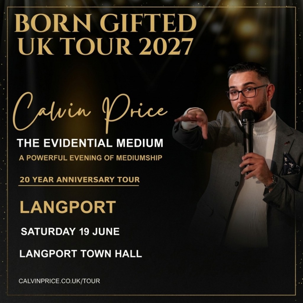 Calvin addressing audience from stage