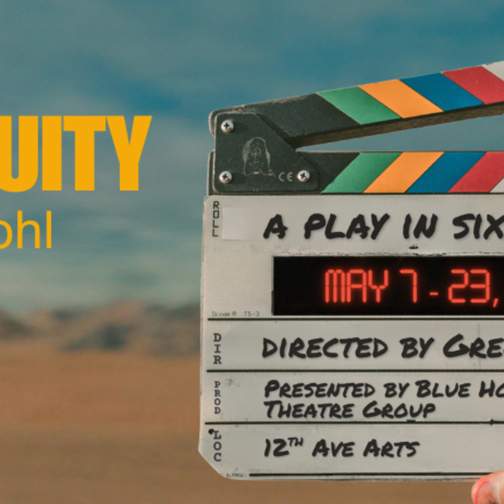hands holding movie clap board