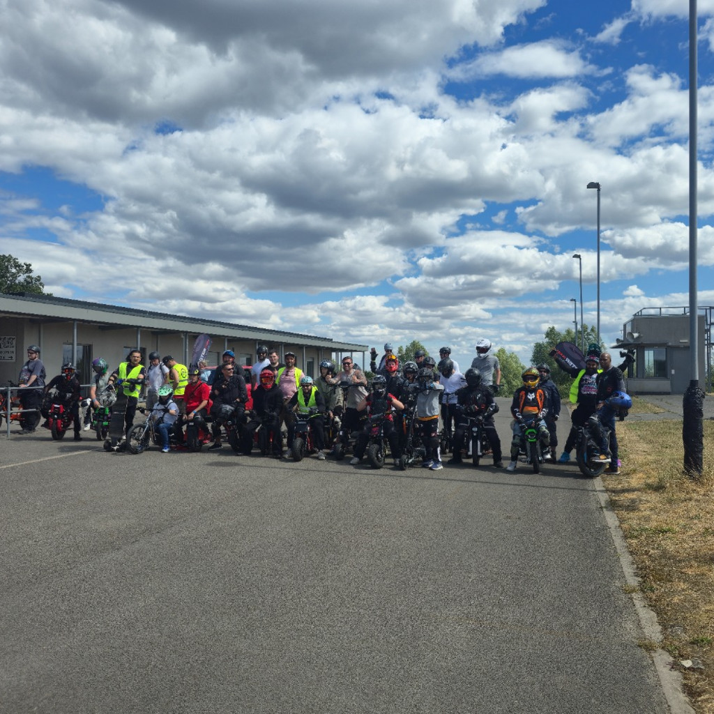 Group of Personal Electric Vehicle Riders Ride Out Ebike Esk8