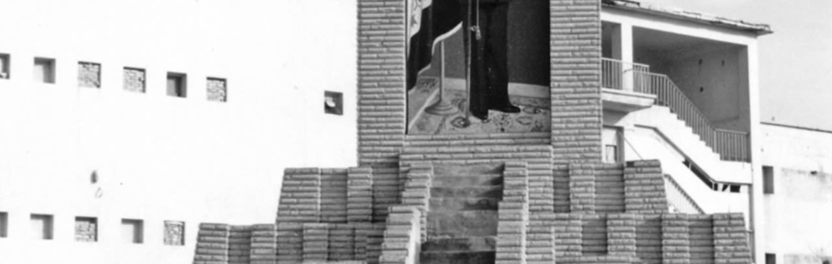 A man walks by a Saddam era replica of the ziggurat of Ur in Nasriyeh in 2000- photo credit Hadani Ditmars