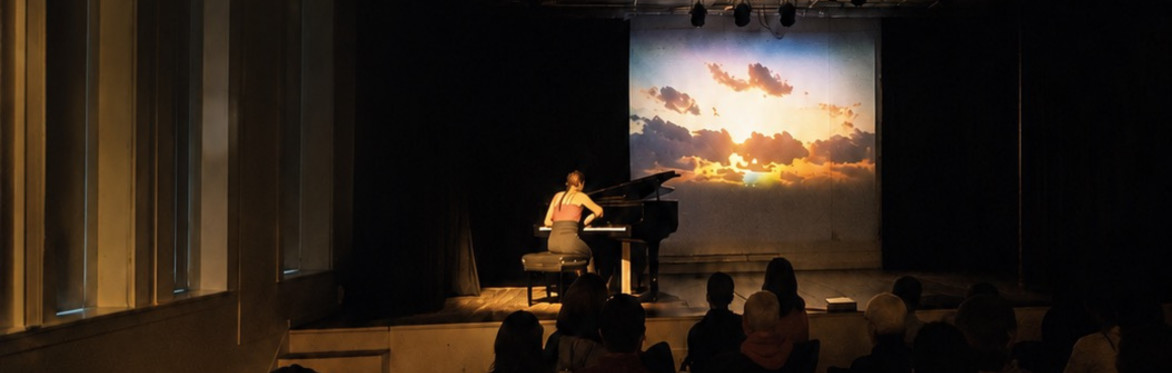 Becky Reesor performing Stop the Clock on grand piano live in studio at Saint John Arts Centre