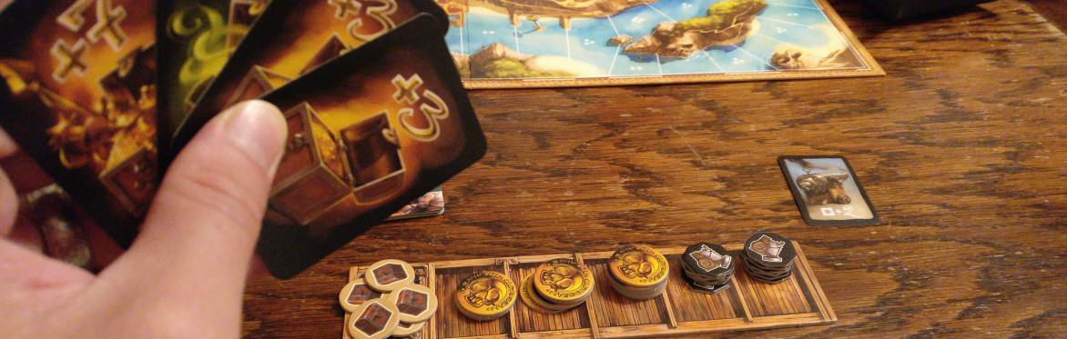 Close up shot of cards and purple wooden turnip tokens on a table from the board game "Village Pillage"