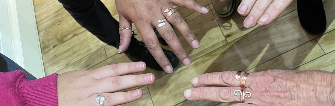a group of five silver wrap rings