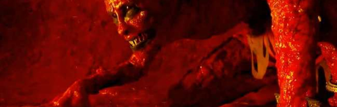 A goopy red man with a crown and terrifying teeth crawls forward