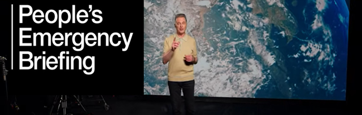 Title of film: People's Emergency Briefing with Chris Packham stood near a picture of the Earth