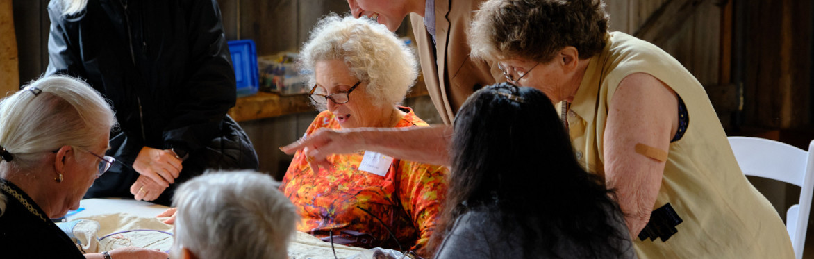 People doing embroidery