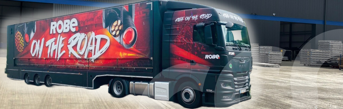 ROBE on the road truck with a warehouse in background