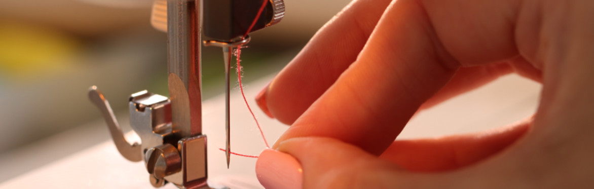 threading a needle on a sewing machine