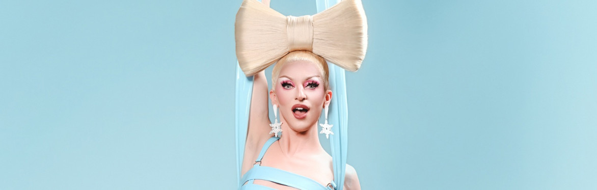 RuPaul's Drag Race star Miz Cracker with a huge bow of hair