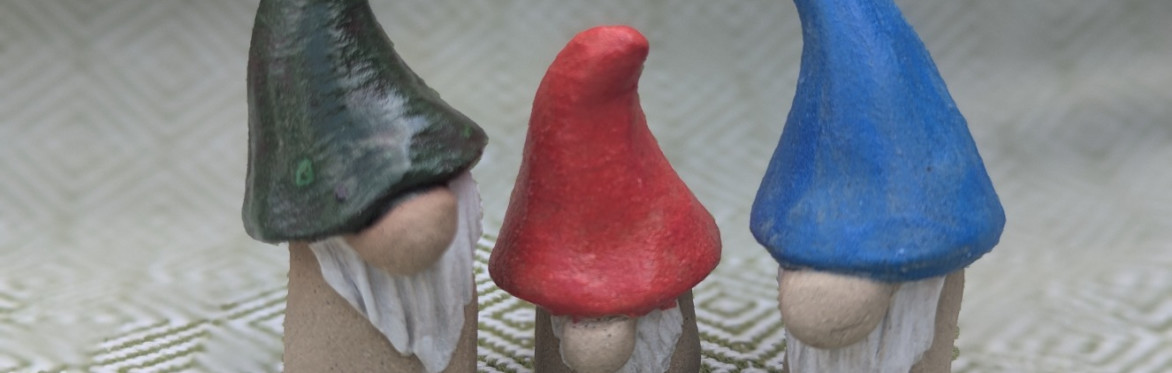 a trio of ceramic gonks