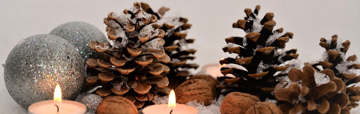 Candle and pine cones