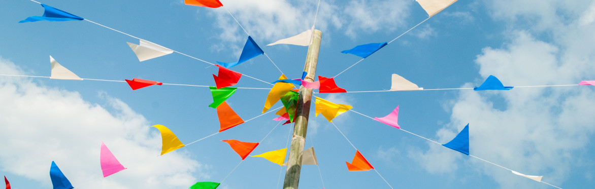 Totem pole with multi-coloured bunting