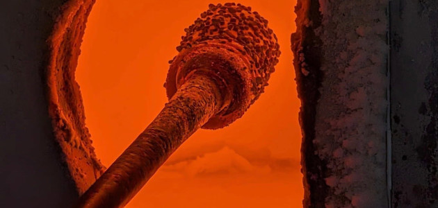 Molten glass glowing inside the furnace at Athens Hot Glass