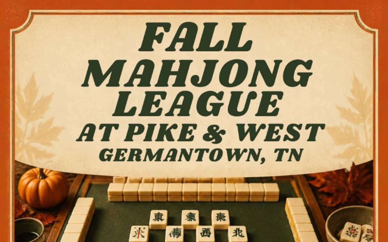 Mahjong tiles arranged on a green table with autumn leaves and a small pumpkin