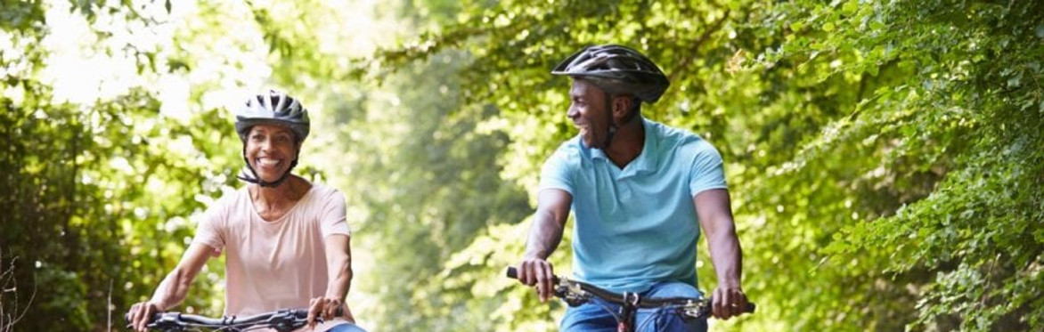 Two people cycling