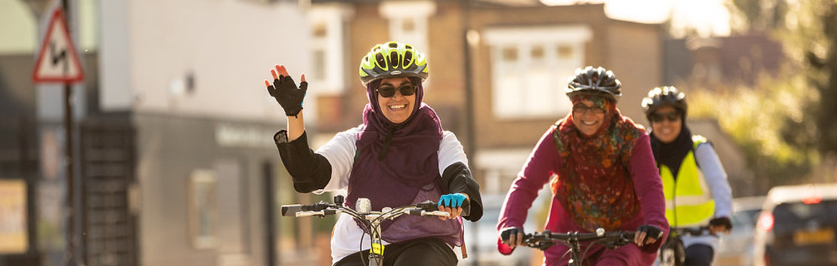Two people cycling