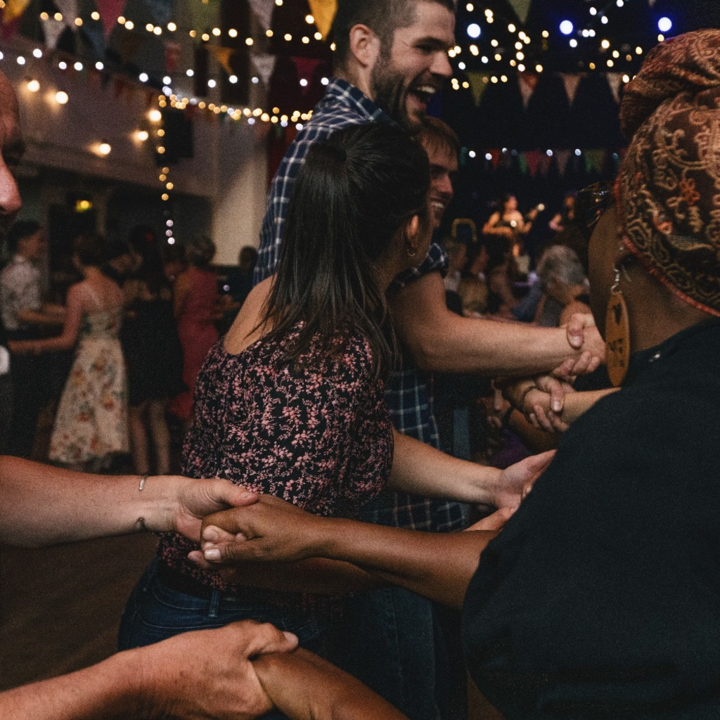 people with wild hair, big smiles, and lovely beards