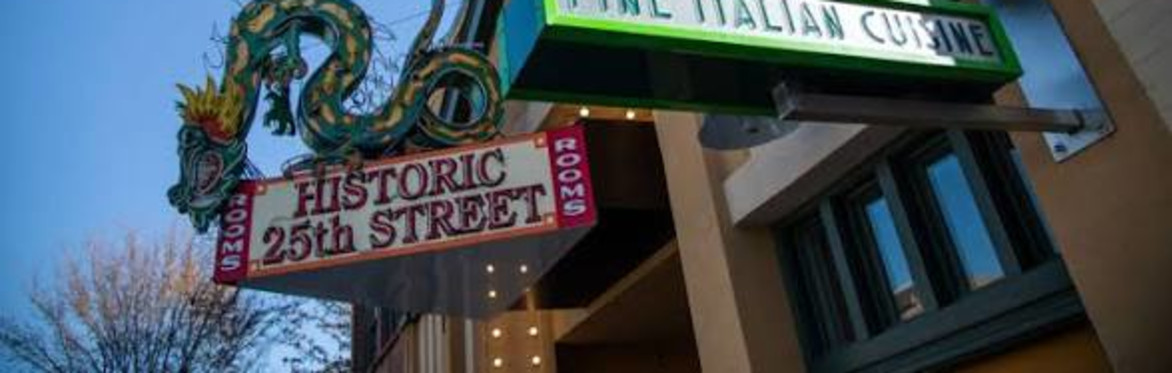 Under neon dragon sign on historic 25th Street Ogden