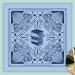 light blue bandana with dark blue design including books, paisley-style patterns and the text: "words, wonder, wisdom", Also shows a cute dog wearing the bandana