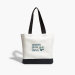 Large Cotton White Tote Bag with black handles and black bottom. Nourish, Grow, Thrive text with green and blue flower design