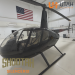 Utah Helicopter in black shown parked in a hanger