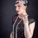 Headpiece with black feather and beautiful rhinestones.