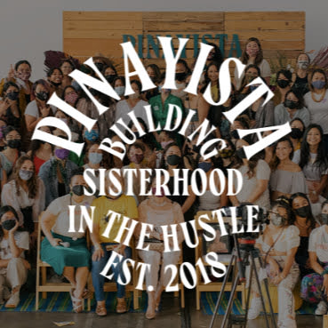 Logo "Pinayista Building Sisterhood in the Hustle Est. 2018" in front of group of people.