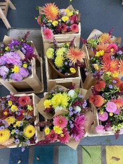 A collection of subscription delivery bunches waiting to be delivered